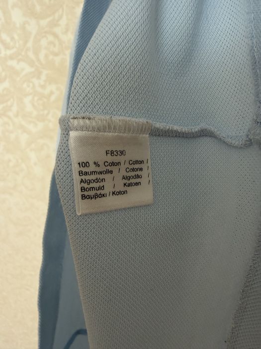 Поло Lacoste розмір L.