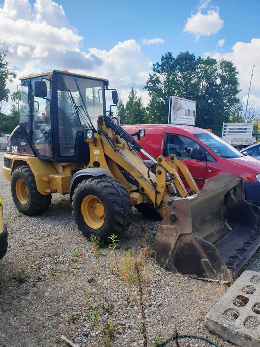 Wynajem Ładowarki kołowej CAT 906  / 450 netto + vat  - 553,50