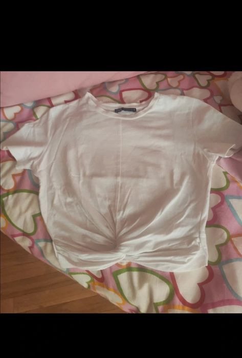 Camisola branca usada