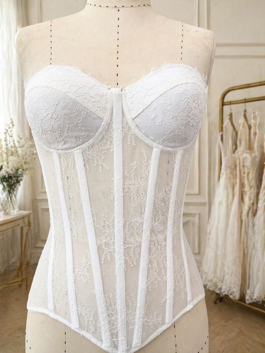 Корсети утягуючі, мереживні корсети, прозорі корсети