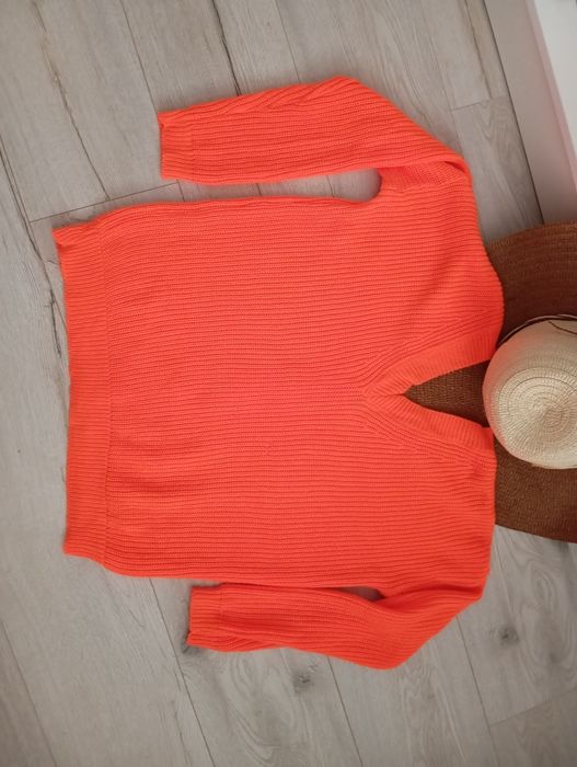Neonowo pomarańczowy zapinany sweter