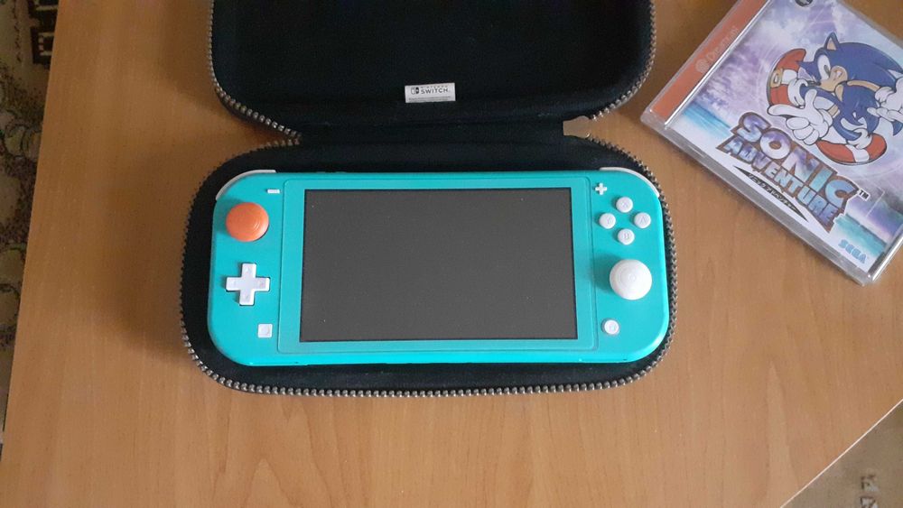 Nintendo Switch Lite + 5 ігор на картриджах