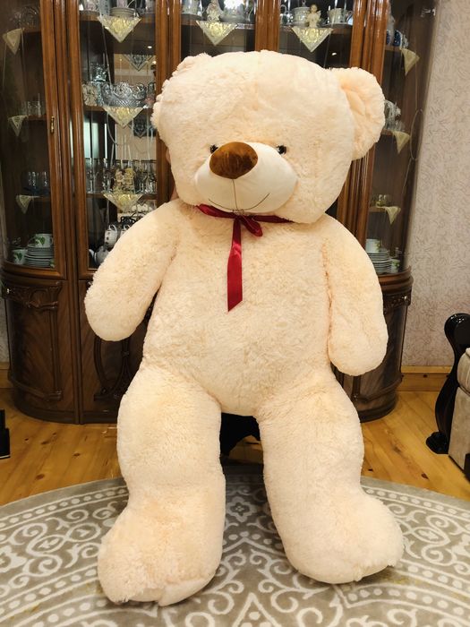 Плюшевий  бежевий ведмідь