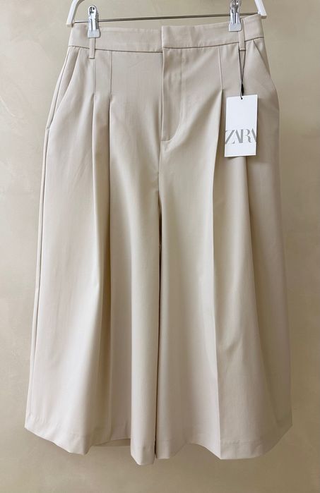 Шорти довгі кюлоти ZARA бежеві з кишенями шорты базові міді пісочні S