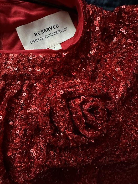 Cekinowa sukienka z bufistymi rękawami rozm. L