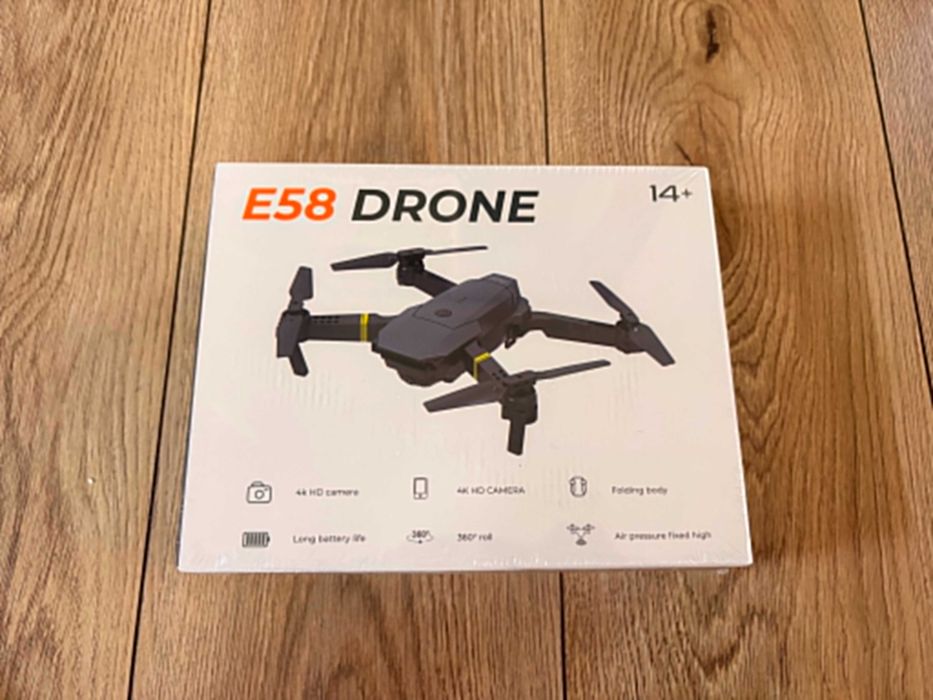 Kompaktowy dron E58 z kamerą Huanchenda nowy w folii