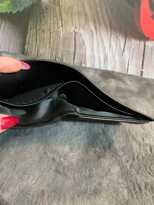 Sprzedam  męski czarny portfel