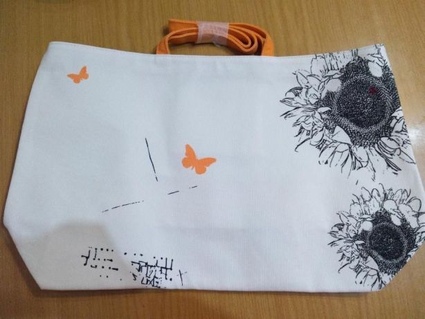 CLARINS mala com alça e dois padrões diferentes dos dois lados NOVO