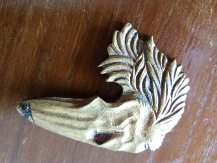 Alfinete cabeça de um cão muito antigo