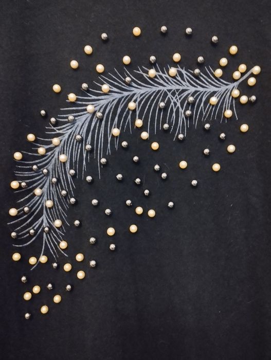 Dłuższy sweterek z perelkami