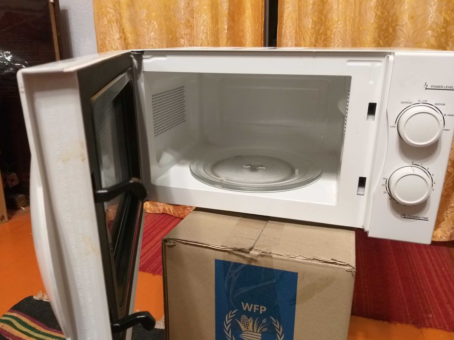 Мікрохвильова піч Candy