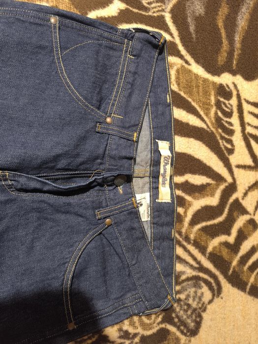 Spodnie męskie jeans Wrangler nowe granatowe W32 L32