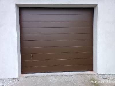 Секційні ворота з каліткою / ролети / автоматика
