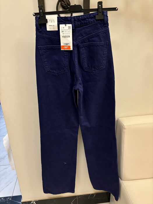 Nowe atramentowe spodnie jeansowe zara