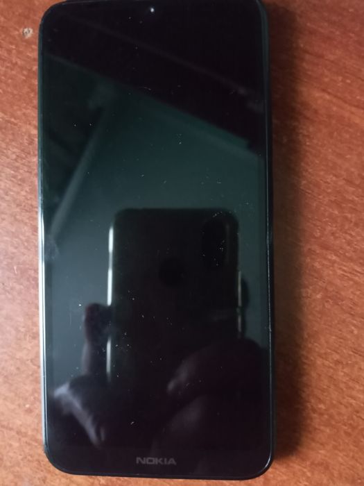 Телефон..сенсорний SONY.