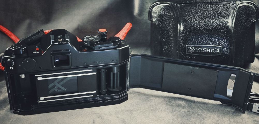 Legendarna YASHICA TL Electro X ITS 1.4/50mm + osłona, przycisk, pasek