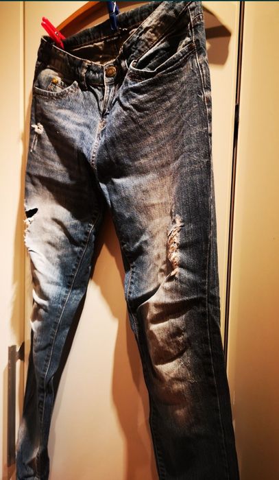 Spodnie jeans przetarcia r 36