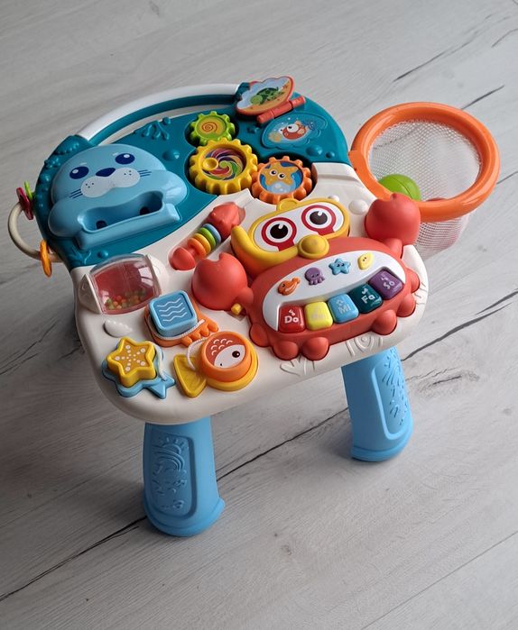 Pchacz i stolik edukacyjny 2w1