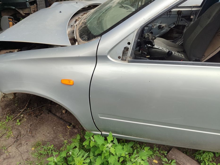 Дверь передняя левая калина гранта