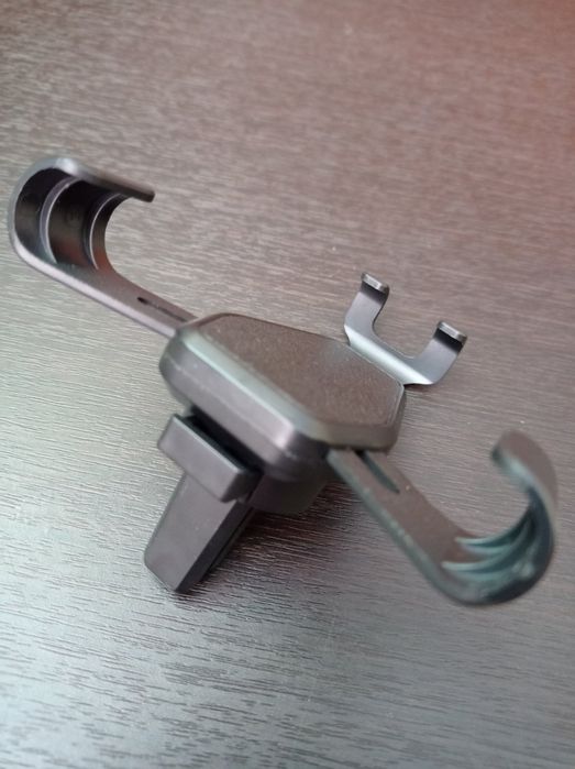 Тримач самозатискний для смартфону в авто