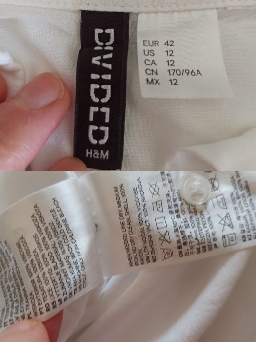 Koszula biała damska z długim rękawem.