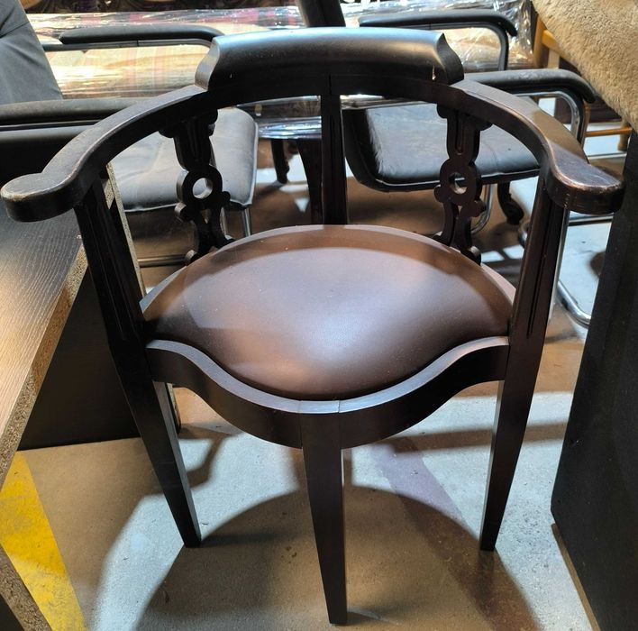 Vintage armchairs, original condition, leather and wood.