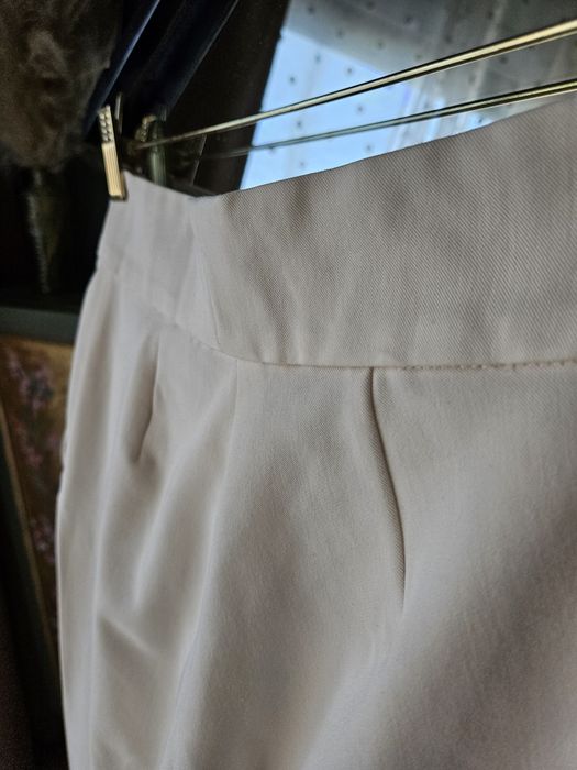 Eleganckie kremowe spodnie damskie H&M proste nogawki wysoki stan XS ś