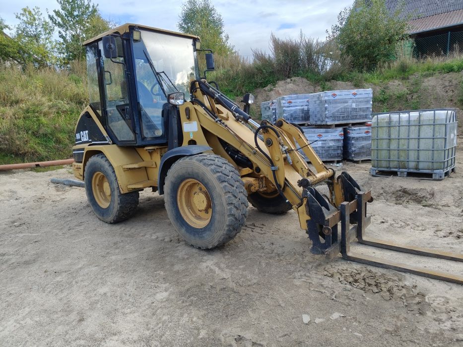Ładowarka Cat 906 widły łyżka