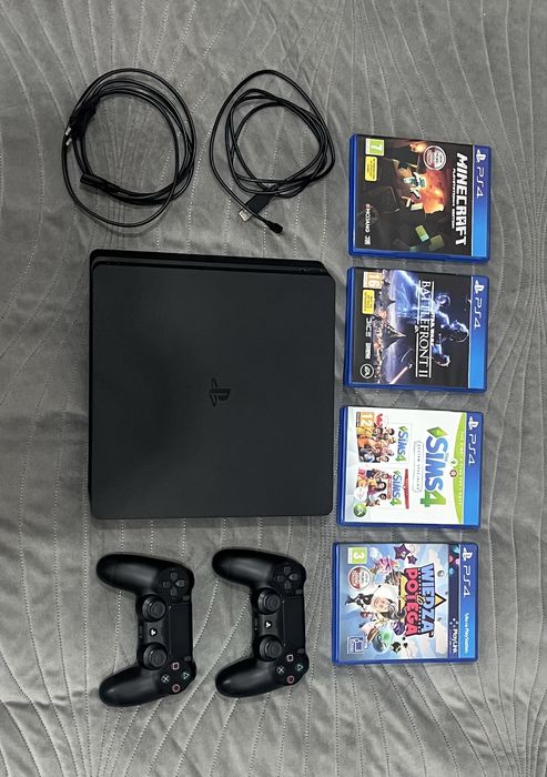 PlayStation 4 slim + dwa oryginalne kontrolery + cztery gry