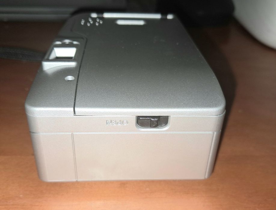 Máquina fotográfica com bolsa