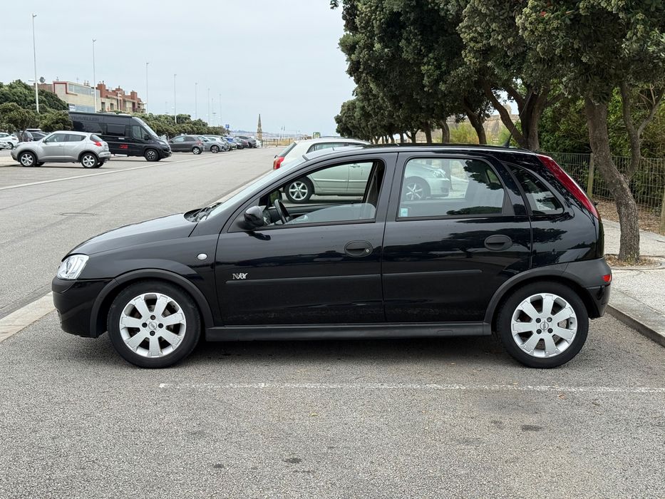 Opel corsa C Enjoy 1.2 gasolina c/teto de abrir