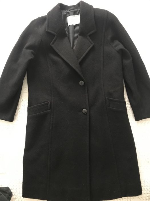 Casaco comprido de fazenda