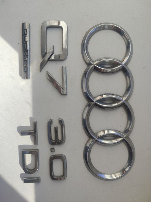 Значки Ауди кватро кю 7 3.0 тді 
Продаю комплект в оригіналі з задньої