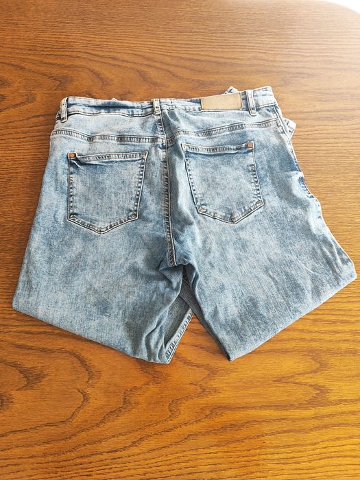 Spodnie jeans reserved roz. 40
