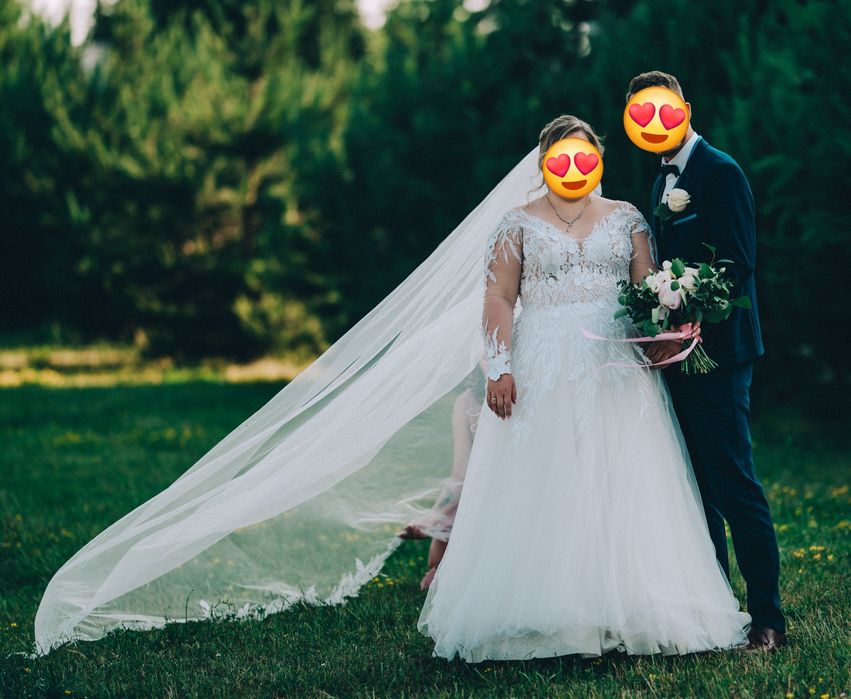 Suknia ślubna długi rękaw piórka