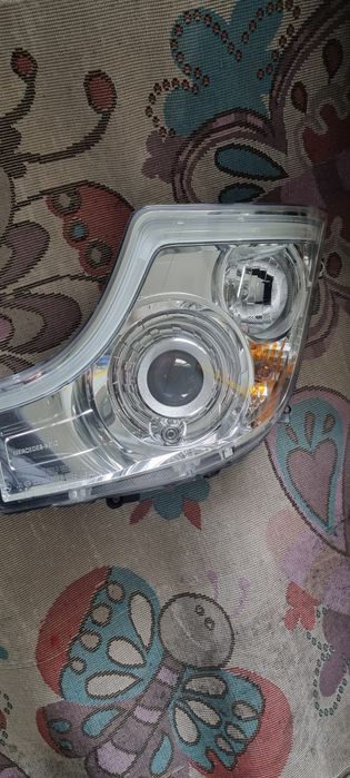 Lampa actros mp5 bixenon lewa strona