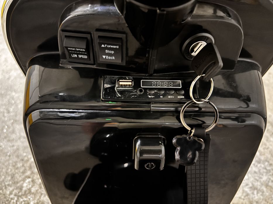 Vespa eletrica para criança