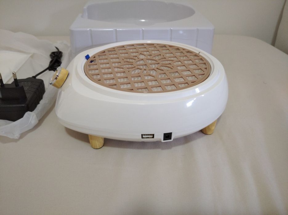 Aspirador de pó unhas