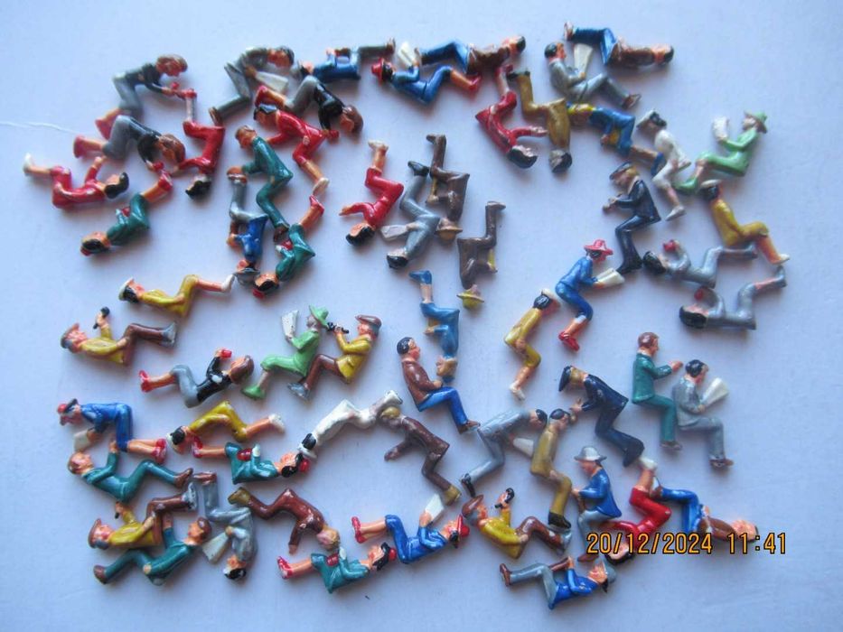 Figuras passageiros comboios escala H0. Ler anuncio