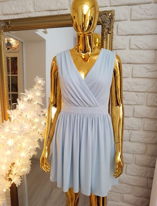 Sukienka błękitna brokatowa L 40