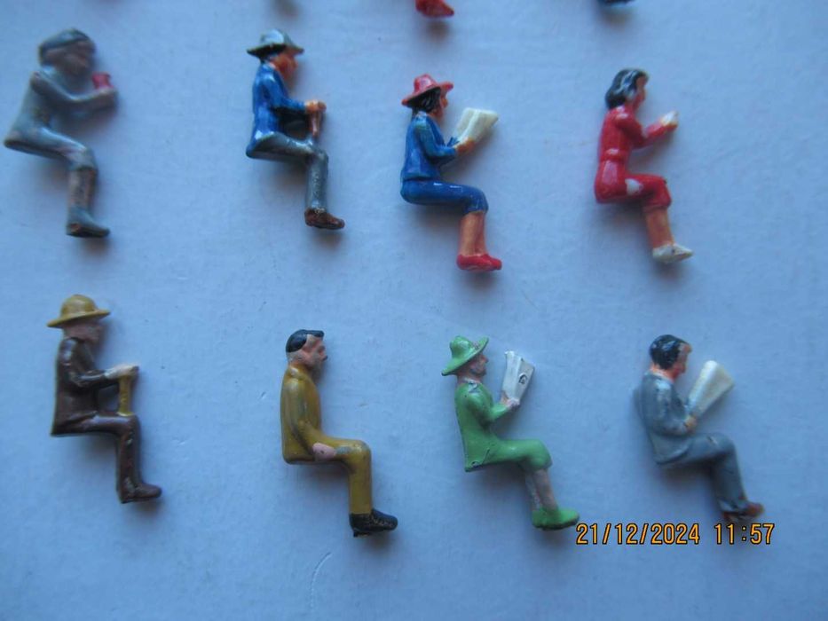 Figuras passageiros comboios escala H0. Ler anuncio