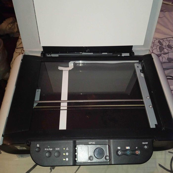 Продам сканер-принтер Canon MP140