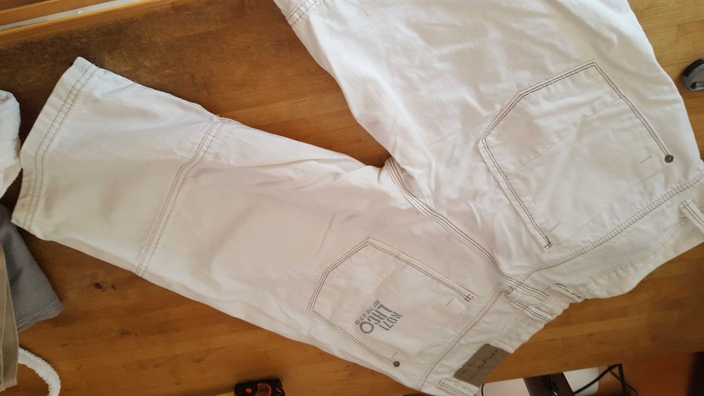 krótkie spodenki z białego  dżinsu rozmiar 54