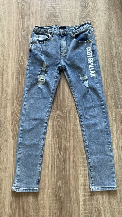 Spodnie jeansy rurki dziewczęce CAT 152