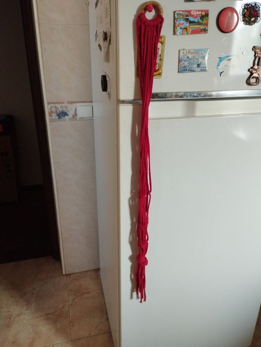 Suporte para plantas em macramé