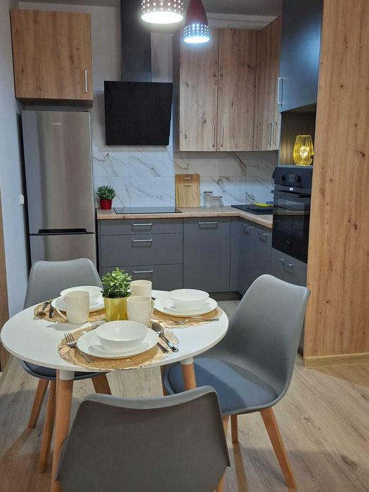 Nowe mieszkanie 2 pok. z miejscem postojowym w garażu, balkonem, klimą i komórką lokatorską w nowym budownictwie - CENTRUM !!!