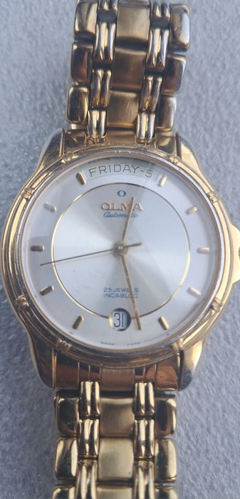 Часы OLMA automatic.