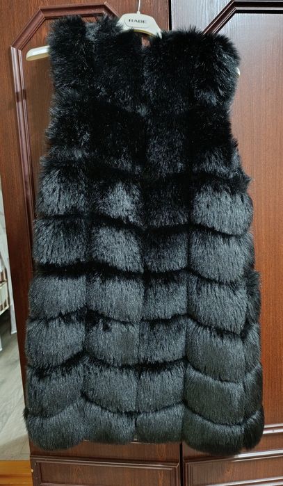 Продам мехову жилетку