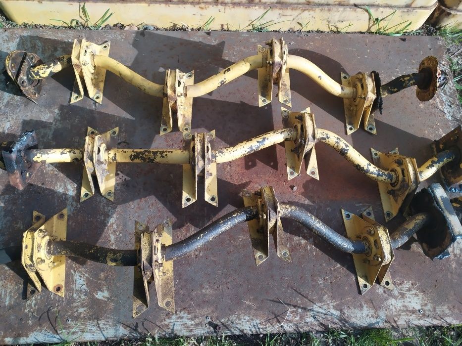 Wał wytrząsaczy New Holland M122, M135, M133, 1520, 1530, 1540 różne