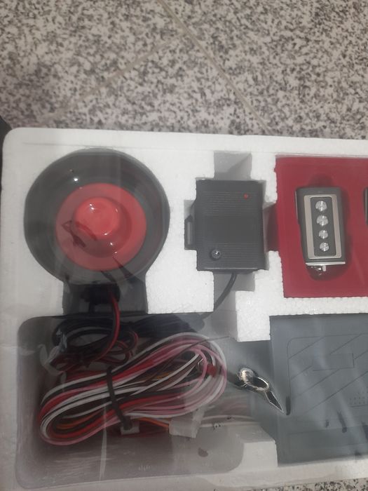 Alarme novo ainda embalado de carro.